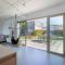 A Factoria Beach House by Prishomes