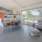 A Factoria Beach House by Prishomes