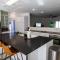Elite Retreat! Hot Tub, Arcade, & Theater. 6 Beds!