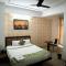 StayVilla Royal Executive Rooms