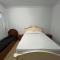 Quarto no centro com 2 camas e hidromassagem