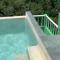 Studio with swimming pool at 12 m height over jungle Studio with swimming pool at 12 m height over jungle