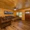 Sweet Mountain Memories Relax affordably cozy cabin with hot tub, game room, and mountain views!