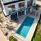 Seaside Luxury Villa with Heated Pool
