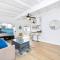 2 Bedroom Upstairs with Balcony Steps from the Sand