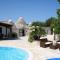 Trullo Olivia con piscina riscaldata, natura e relax