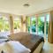 Villa and Pool walk to Palm Beach ideal for GROUPS