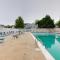 Stylish 2BR Condo Near Beach, Large Pool & Patio, Pet Friendly