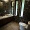 BAÑOS GLAMPING LEONORÈ - Baños