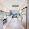 Waterfront Wonder Expansive Indoor-Outdoor Haven