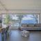 A Factoria Beach House by Prishomes