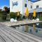 Fewo mit toller Dachterrasse & Bademantelgang zur Wohlfühltherme im neuen Stil