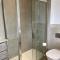 En-suite bedroom in a family home near Gatwick airport and Horley station