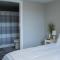 2 bed, 2 story, In-law suite in rear of main house