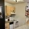 Getaway Villa- 3 mins to Mohegan- Fully Stocked with Two Full Beds & Fireplace- Jacuzzi, Saltwater Pools, Sauna