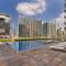Oraya - Cozy 2BR in Reva Residence I Direct Pool Access - Dubaj