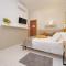 Opera Inn Suites - Rooms and Apartments