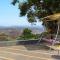StayVistas Lawn House at Sula Wada - Vintage-Charm Cosy Home with Swimming Pool and Indoor Activities