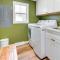 Bright Houghton Lake Home with Boat Dock and Fire Pit
