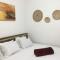 Suites Mar e Lua em casa compartilhada