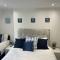 5 bed, 5 bath New refurbishment for 2024. Sleeps 16, 60 yds beach & harbour