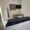 Hostel Quartos com banheiro individual perto do Aeroporto - جوارولوس
