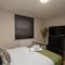 Benjamin Suite - Modern 3BR Apartment with Parking & WIFI Benjamin Suite - Modern 3BR Apartment with Parking & WIFI
