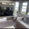 Experience Coastal Bliss in Our Modern 2019 Sea Viev 2 Bedroom static caravan at Clarach Bay Holiday Village!