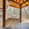Grand Broken Bow Cabin with Hot Tub and Spacious Deck!