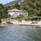 Apartments with a parking space Barbat, Rab - 22498 - Rab