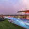 StayVista at Mangifera Agro Estate with Pool, Wi-Fi