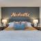 Walk to Broadway Riverfront Condo with Pool