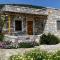 Traditional stone-built cottages Azalas - Moutsoúna