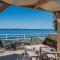 Exclusive Seaside Retreat with Shared Pool & Private Beach Access