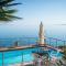 Exclusive Seaside Retreat with Shared Pool & Private Beach Access