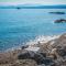 Exclusive Seaside Retreat with Shared Pool & Private Beach Access