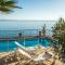 Exclusive Seaside Retreat with Shared Pool & Private Beach Access