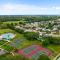 Cappy Hour! Lakefront townhome with backyard paradise and amazing community amenities! - 布雷登顿