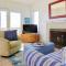 Cheerful 3 Bedroom Beach Front Cottage with Fire Place