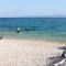 Apartments with a parking space Zivogosce - Blato, Makarska - 22253
