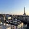 Tour Eiffel - Studio vue imprenable au-dessus des toits, balcon - Paris