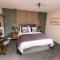 Stylish-2BR, Boutique property, 5min to ManAirport