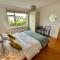 Lovely house & garden, short walk to town & beach.