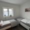Ferienhaus "Golden Delicious" Meppen Ebenerdig Carport Terrasse Neubau NETFLIX Free WIFI 2 Schlafzimmer Küche GästeWC