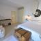 Luxurious waterfront villa Christina in the area of Melissaki with a swimming pool, sea and sunset view