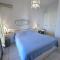 Luxurious waterfront villa Christina in the area of Melissaki with a swimming pool, sea and sunset view