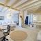Luxurious waterfront villa Christina in the area of Melissaki with a swimming pool, sea and sunset view