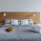 oompH UrbanVibe Centrum Stylish 2BR Hideaway