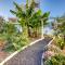 Spacious Home with Tropical Garden, BBQ, Near Seaside