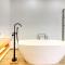 Spacious Home with Tropical Garden, BBQ, Near Seaside